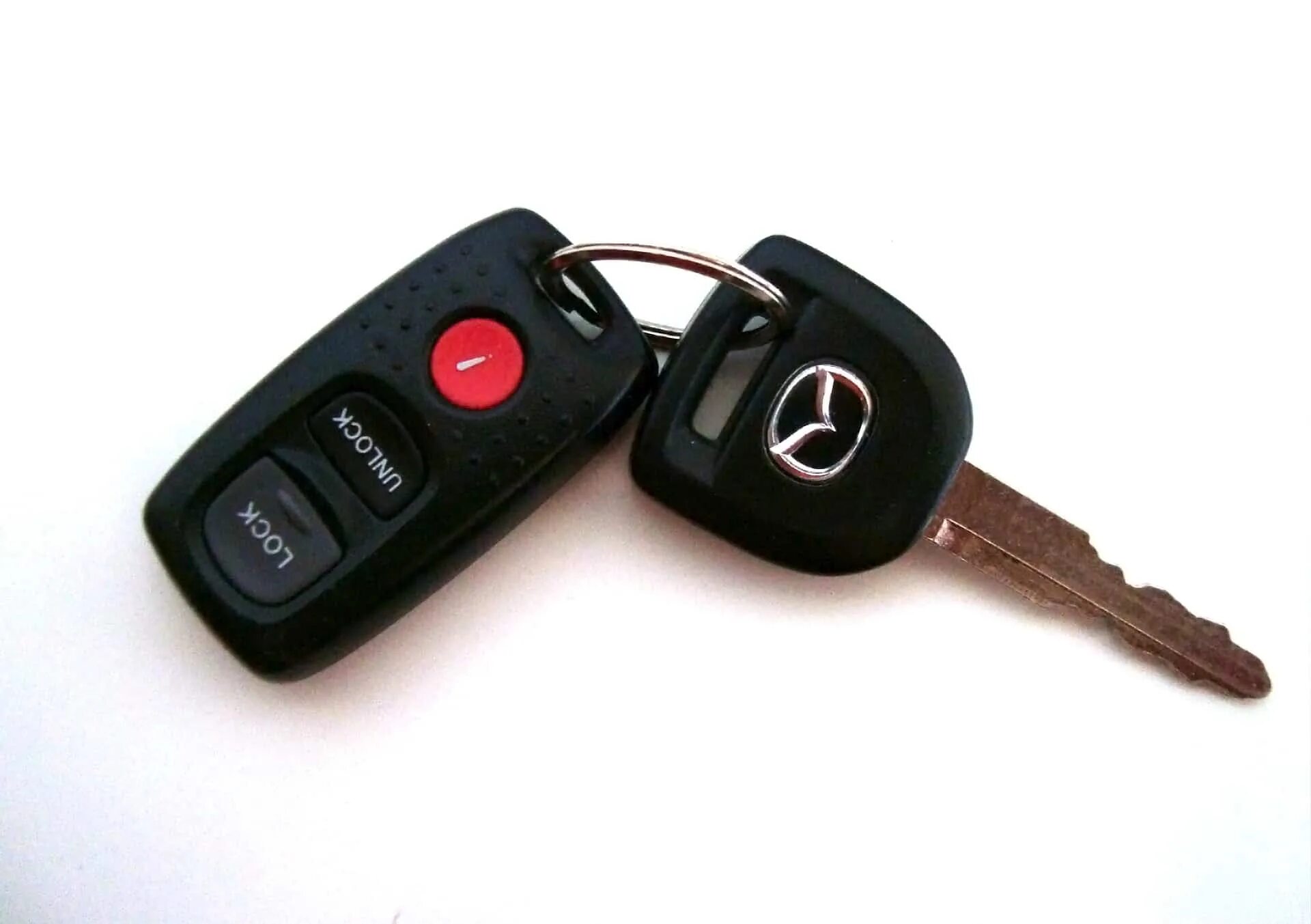 Ключи мазда 3 бк. Ключи сигнализация Мазда 3. Брелок сигнализации Мазда 3 БК. Батарейка для ключа Мазда 3 2008. Mazda 3 2005 ключ.