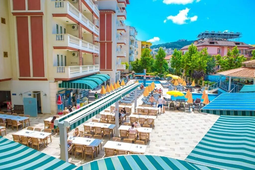 Конаклы villa sun flower. Villa Sun Flower Hotel 4*. Вилла Санфлауэр Турция Аланья. Турция Аланья отели Billa Sunflower Suite. Отель в Алании Comfort Suites.