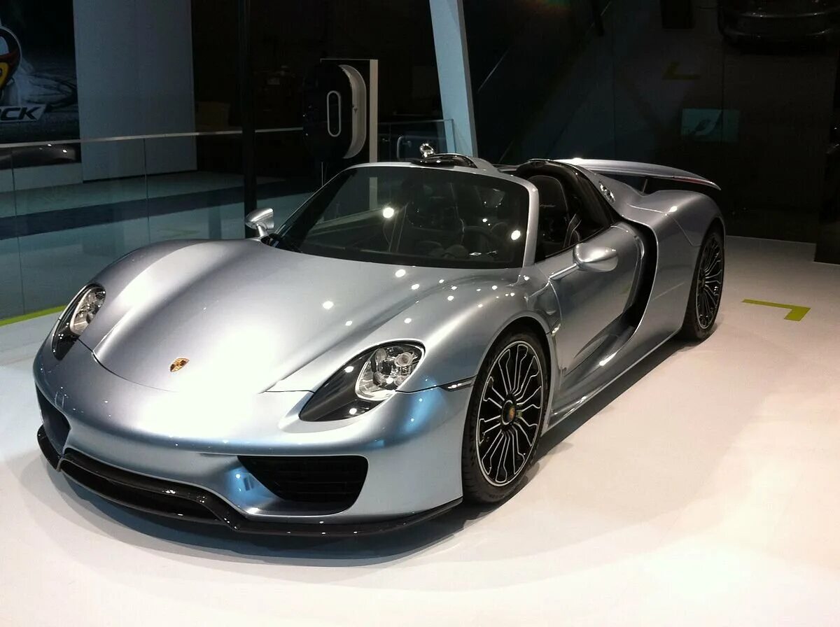 Порше сколько лошадиных. Porsche Carrera gt 2005.Porsche.918.Spyder.. Самый быстрый порш вмире918 Spyder. Porsche Carrera gt Spyder. Порше 918 в России.