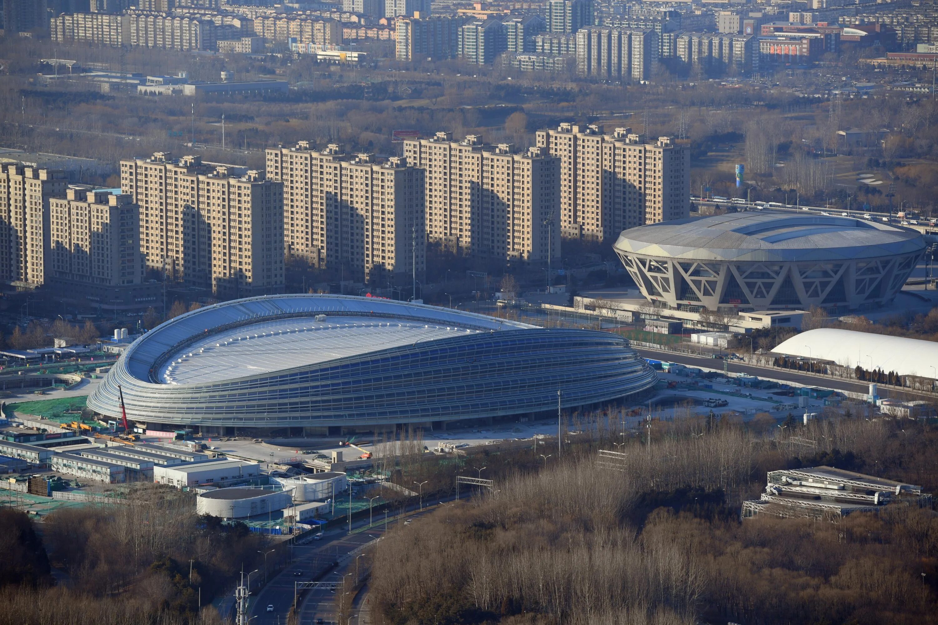 Стадион это объект. Олимпийские объекты в Пекине 2022. Олимпийский городок Пекин. Столичный дворец спорта в Пекине 2022.