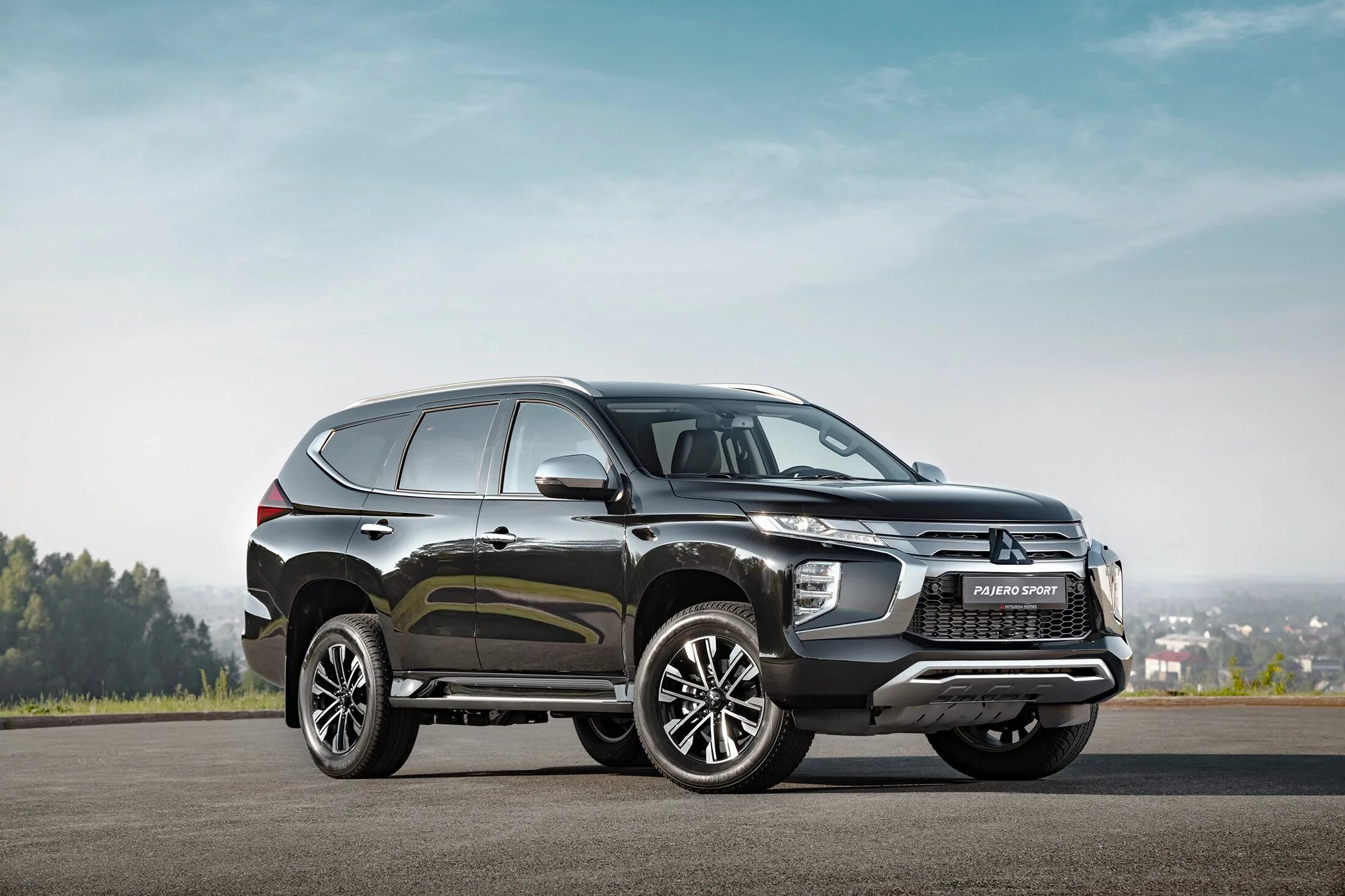 Новый mitsubishi pajero sport. Новый Митсубиси Паджеро спорт 2022. Мицубиси Паджеро спорт 2022 новый. Новый Mitsubishi Pajero Sport 2023. Новый Мицубиси Паджеро 2022.