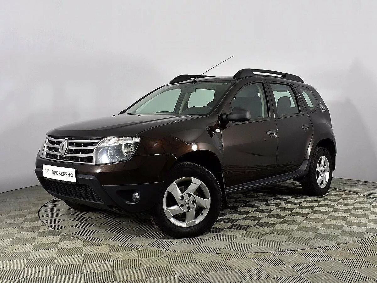 Купить дастер кредит. Renault Duster 2014. Renault Duster 2014 коричневый. Рено Дастер 2014. Renault Duster коричневый.