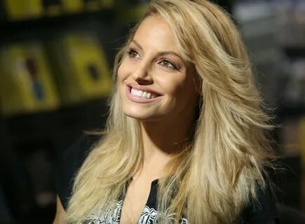 Fans ask if Trish Stratus has had plastic surgery after WWE return.