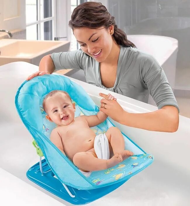 Приспособления для купания в ванной. Лежак Summer Infant Deluxe Baby Bather. Горка для купания Baby Bather Delux. Лежачок с мягким подголовником Deluxe Baby Bather от Summer Infant. Лежак для купания Summer Infant Bath Sling.