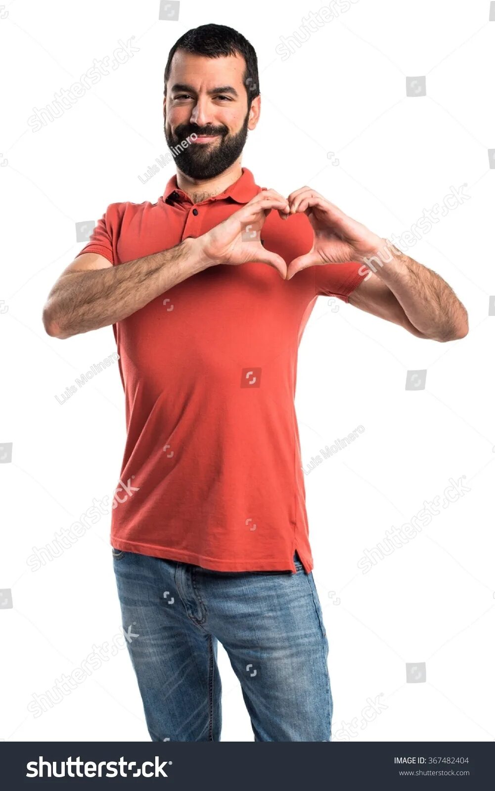 Парень делает сердечко. Парень показывает сердце. Парень показывает сердце. Парень показывает сердце руками. Парень делает сердечко.