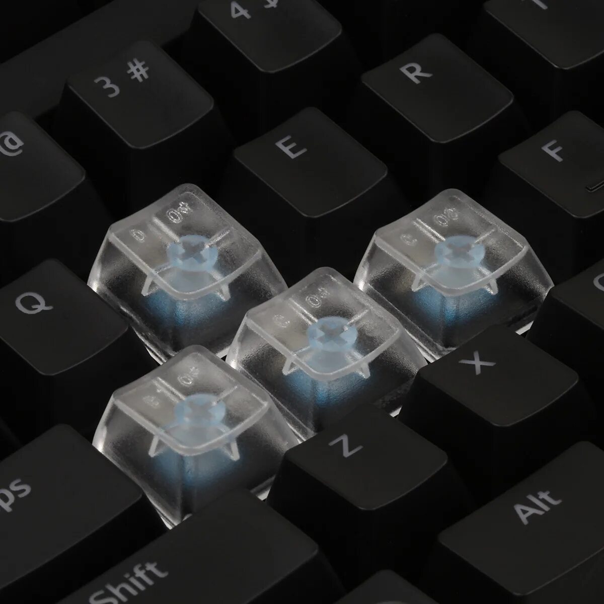 Clear key. Clear keycaps. transparent keycaps. cherry mx clear. keyboard with blank keycaps.