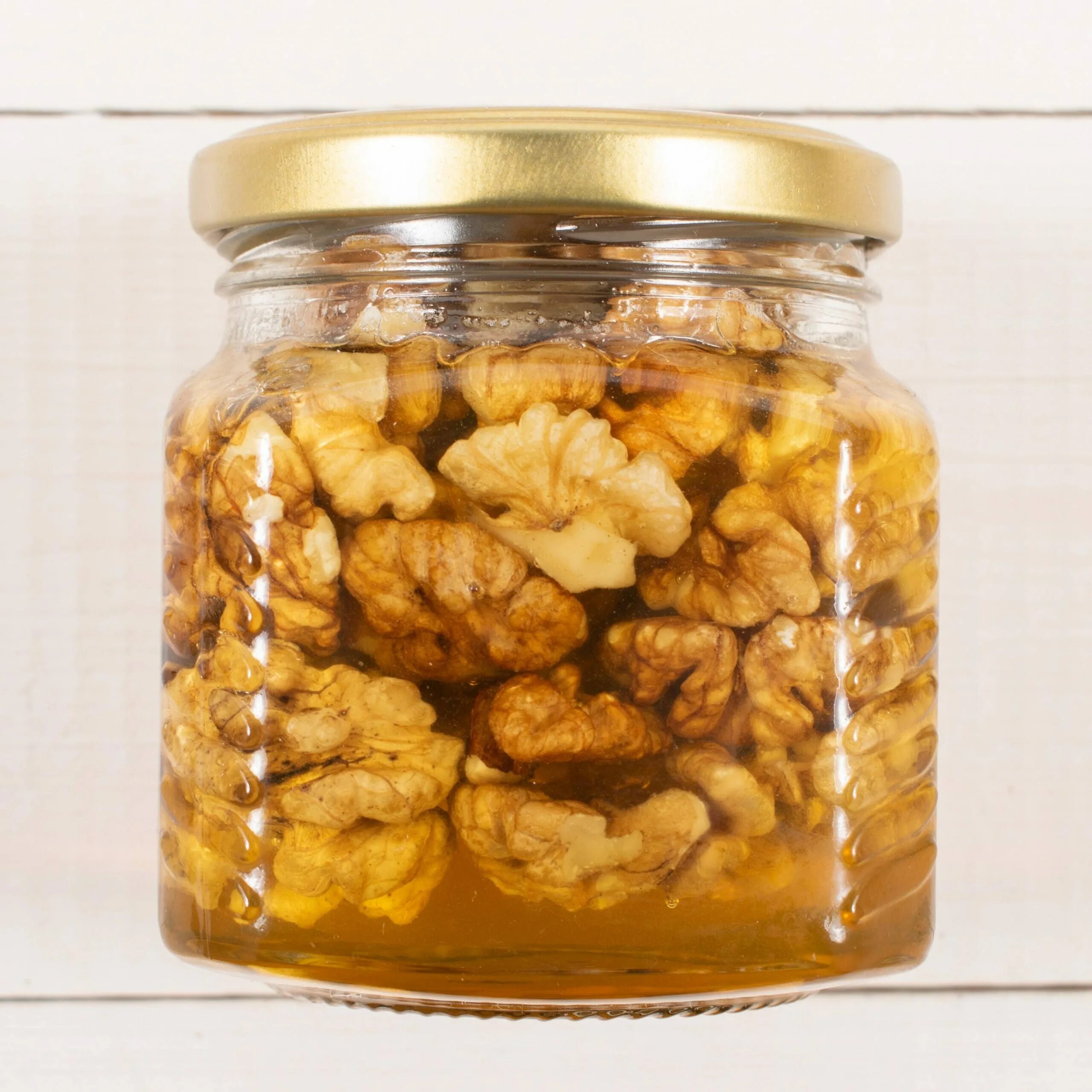 мед с орешками. грецкий орех в меду (120мл). рецепт как сделать орехи в меду. орехи в меду в банке. грецкие шарики с медом.