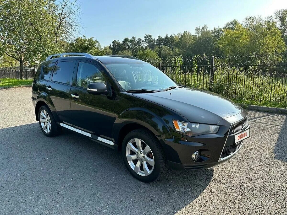 Обзор mitsubishi outlander 2 рестайлинг. Аутлендер 2008 черный фото. Mitsubishi outlander xl 2012. Mitsubishi outlander 2007 3. Мицубиси аутлендер хл бу.