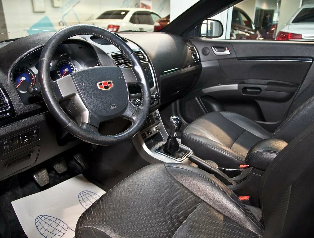 Geely emgrand x7. Geely mk седан 1. Geely emgrand x7 2016 салон. Emgrand ec7 салон. Фото машины джили салон.