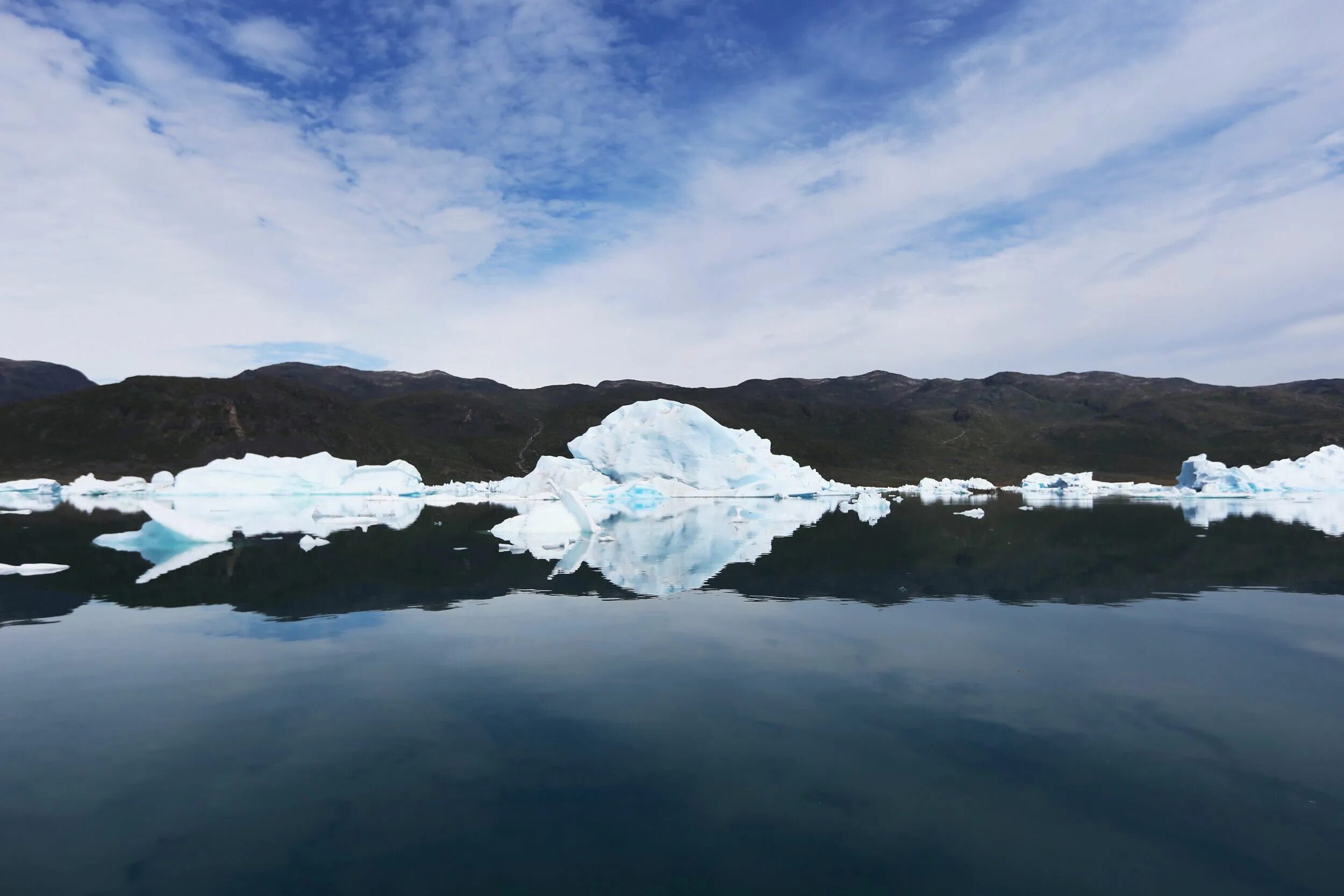 Таяние ледников в Гренландии. Гренландия пейзажи. Горы Гренландии. Гренландия фото природы.