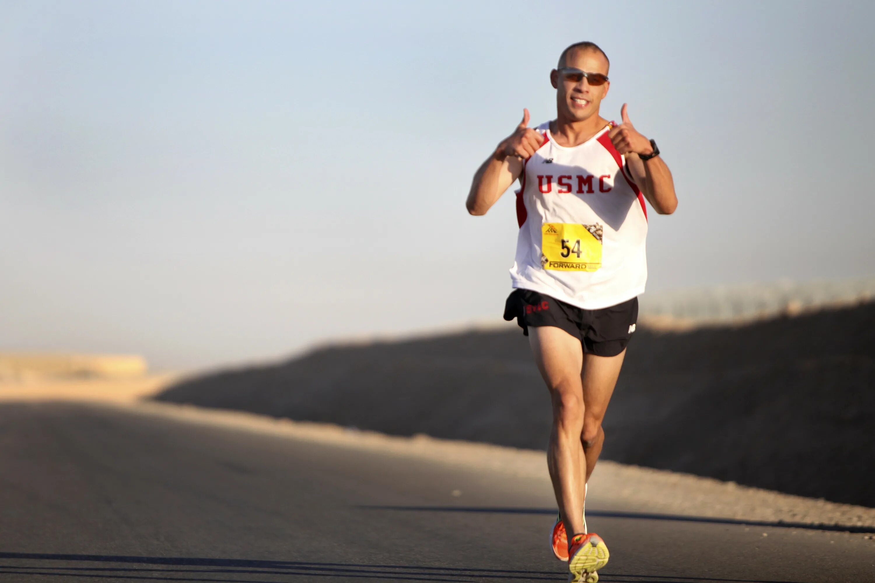 He runs well. What is he doing he is Running a Marathon. Running with Toast. He will Run. The Runner standing at the start PNG.