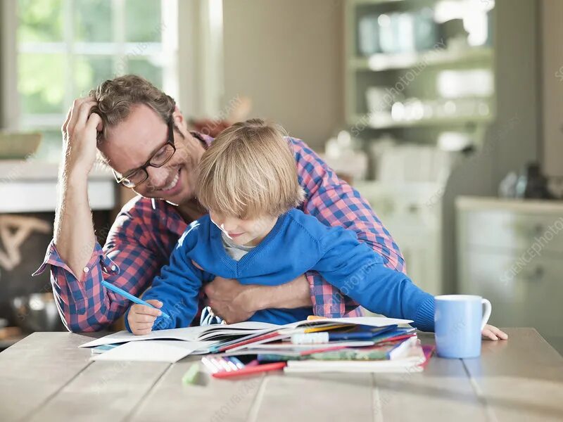 Фото отец обучает сына. Сын дома картинки студент. Parents and children at Home doing homework. Famille домашнее задание. Does your son