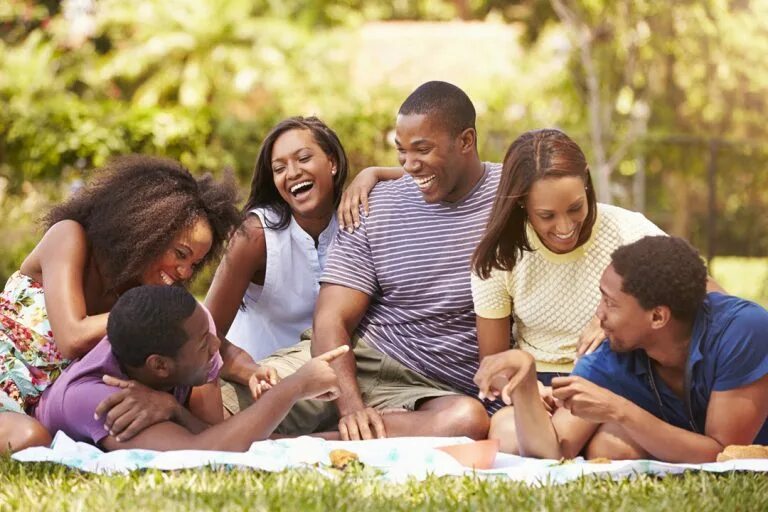 Young people on a Picnic картина. Black friend. Two Black friends. Young people Gathering.