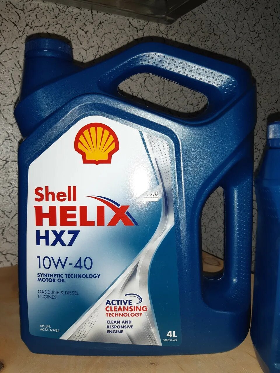Масло шел 10 w. Shell helix 10w 40 бензиновый. Шелл 10w 40 полусинтетика. Масло шел 10 w. Шелл хеликс 10w 40 синтетика.