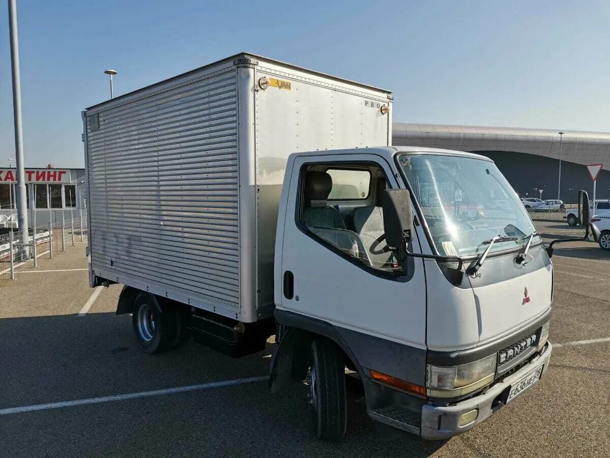 Mitsubishi шасси. Mitsubishi Canter 1999. Митсубиси Фусо 1999. Митсубиси Фусо автомобиль грузовой. FTDKK-0 10 Т фургон.