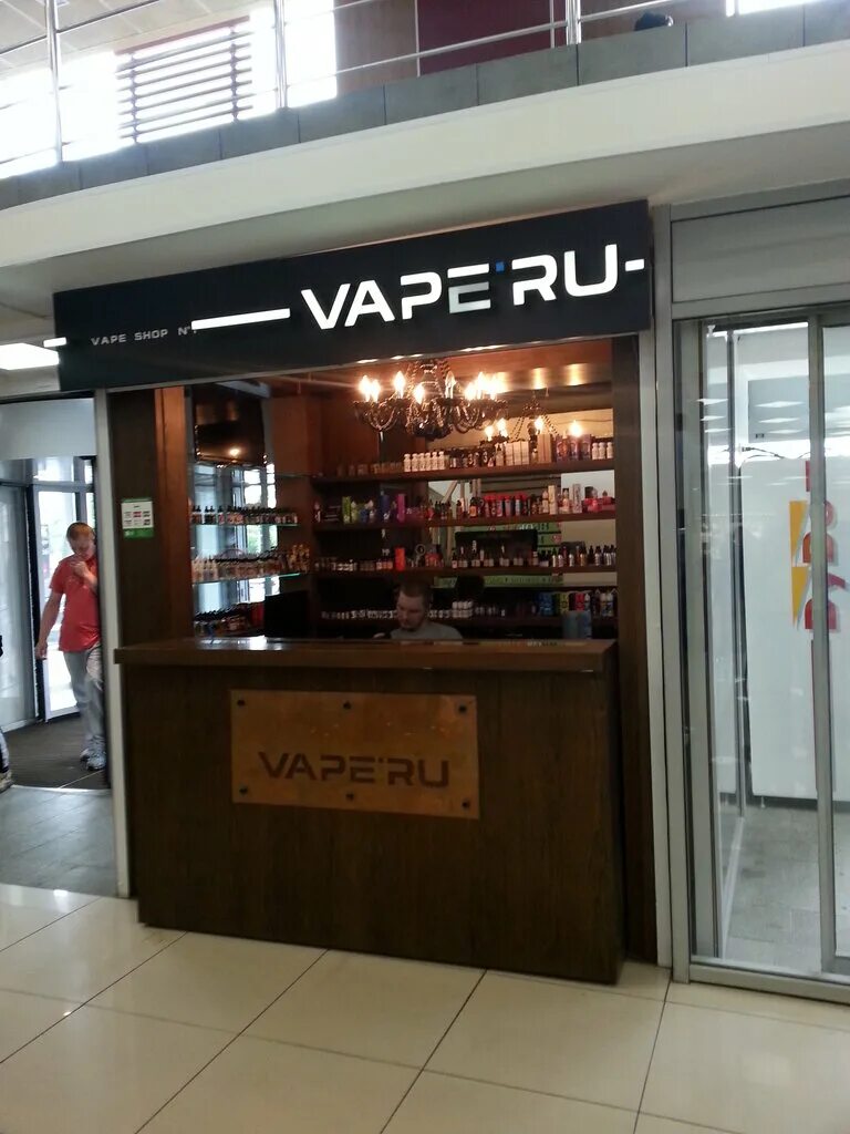 Вейп магазин в москве. Вейп шоп. Магазин вейп шоп. Вейп магазин Москва. Vape shop вывеска.