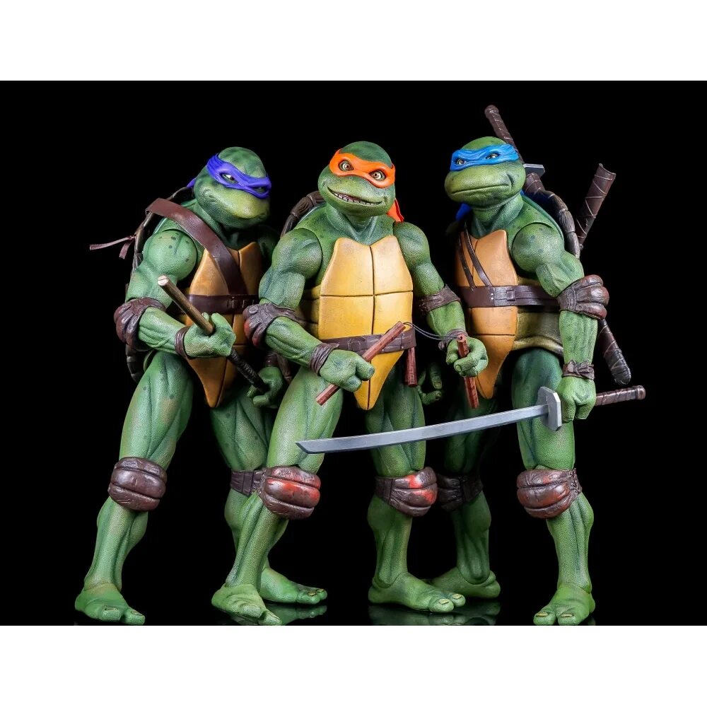 Ninja turtles купить. Фигурки NECA TMNT 1990. Микеланджело Черепашки-ниндзя 1990. Микеланджело Черепашки 1990. TMNT Микеланджело 1990.