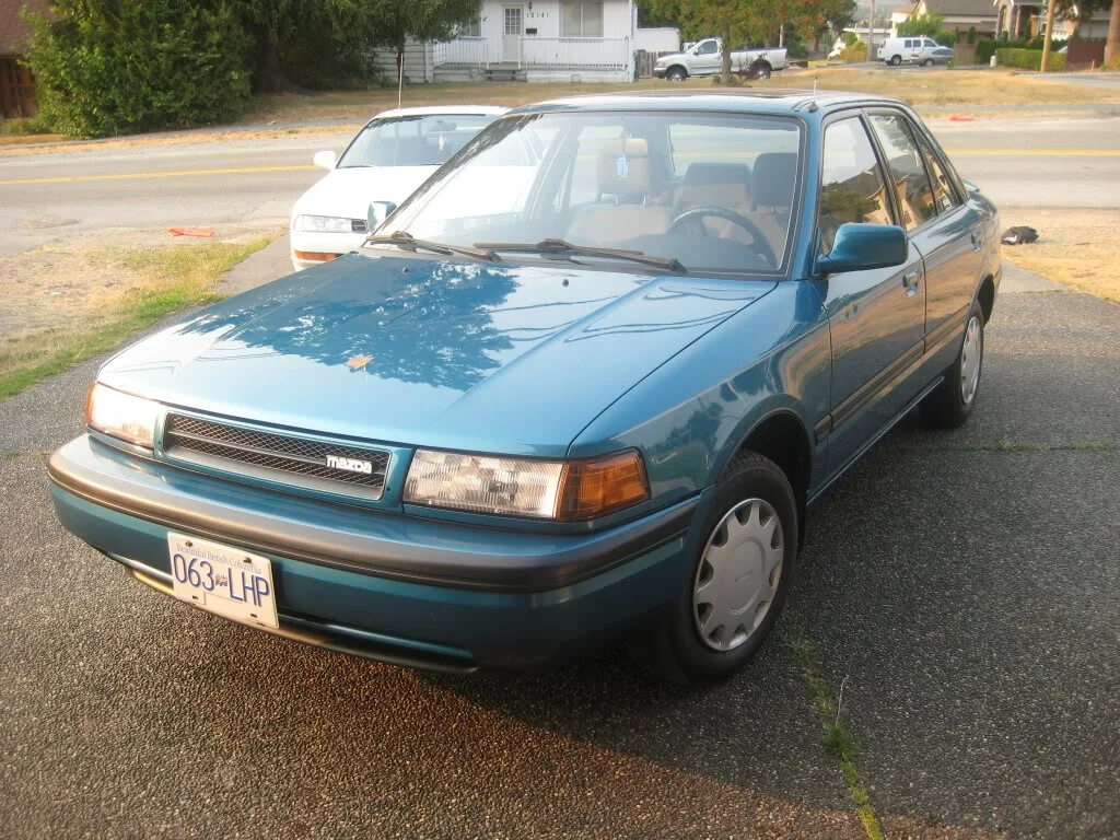 Mazda 1992. Мазда 233 1992. Мазда 626 1992. Мазда 626 protege. Мазда протеже 1992.