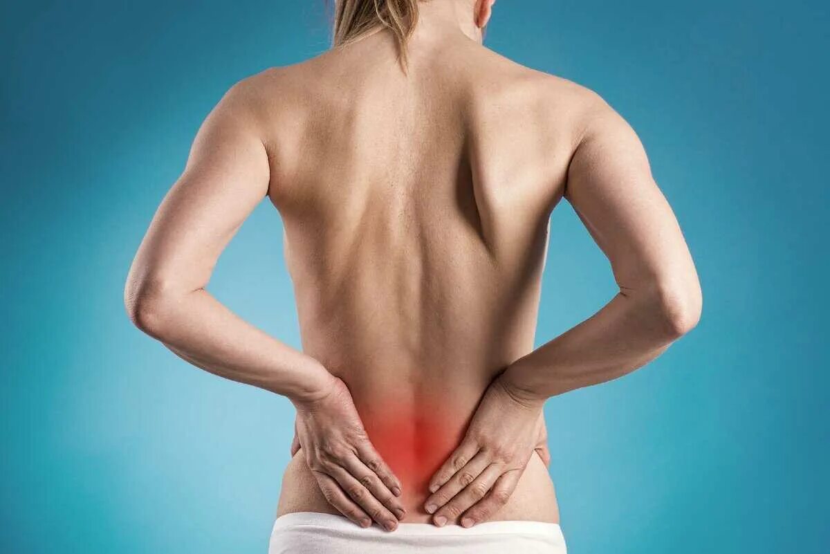 Частые боли в спине. Спина человека. Поясница. Боль в пояснице. Женская спина.