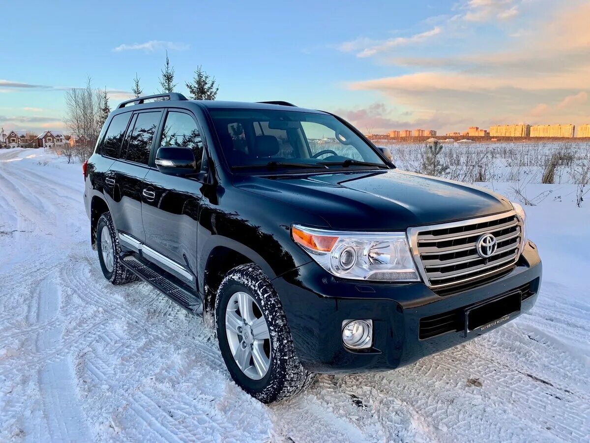 за рулём toyota land cruiser 200. черный тонированный крузак 200 2013. тойота ленд крузер 200 2013 дизель. Toyota land cruiser 200 2008 4. с.