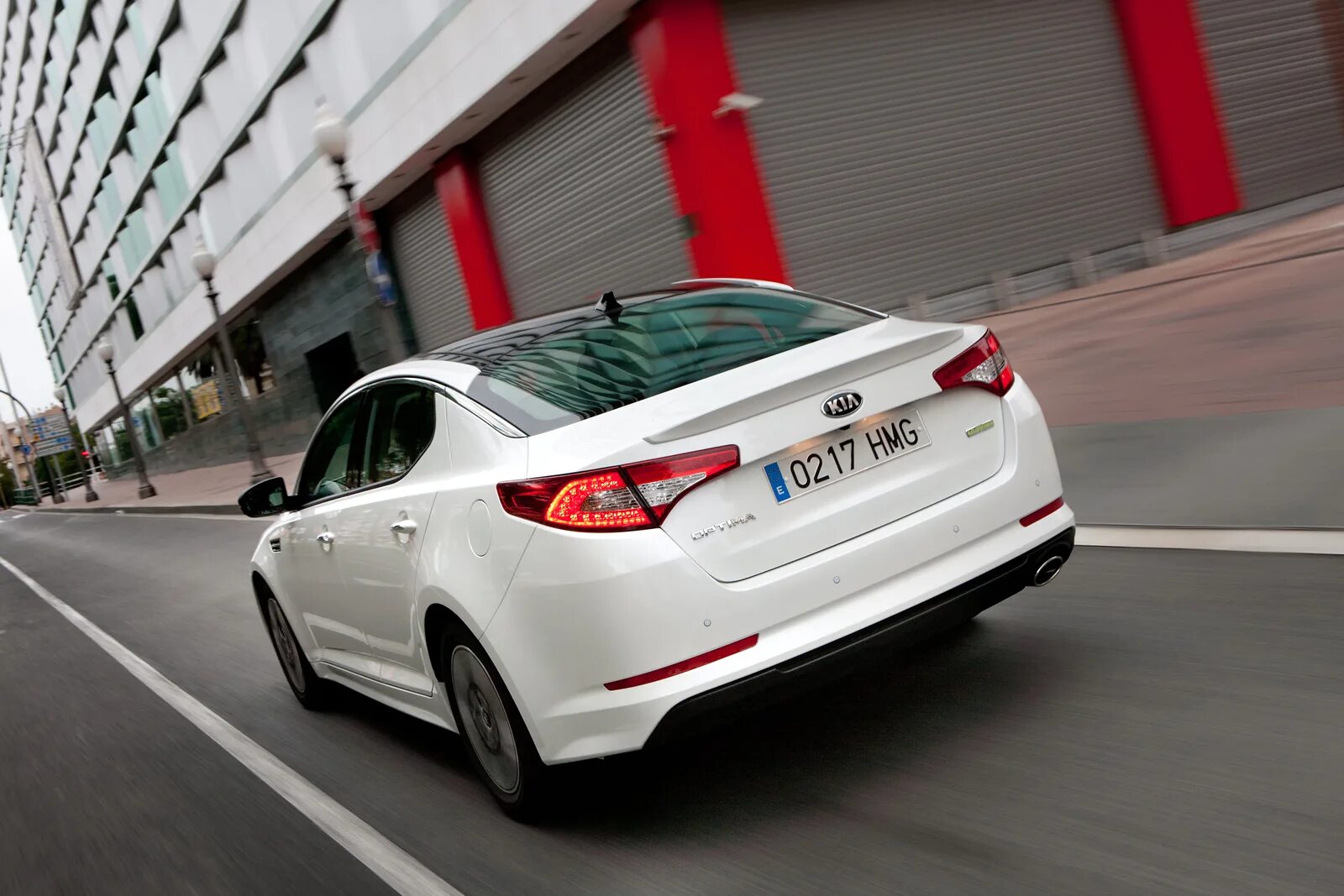 Киа оптима в спб. Kia Optima Hybrid 2013. Kia Optima 23. 2012 Kia Optima 2.4 гибрид. Kia Optima 2015 White Edition.