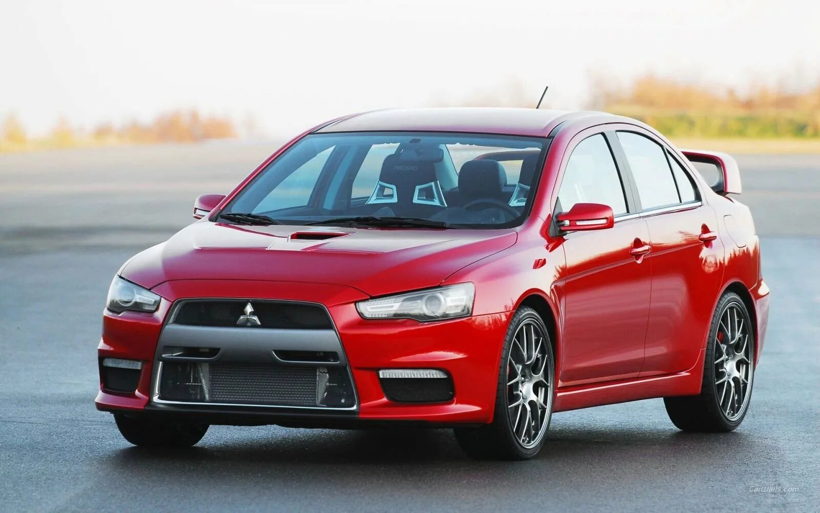 Lancer 10 кузов. Mitsubishi Lancer EVO 11. Mitsubishi Lancer Evolution 12. Митсубиси Лансер 10. Lancer Evolution 10.