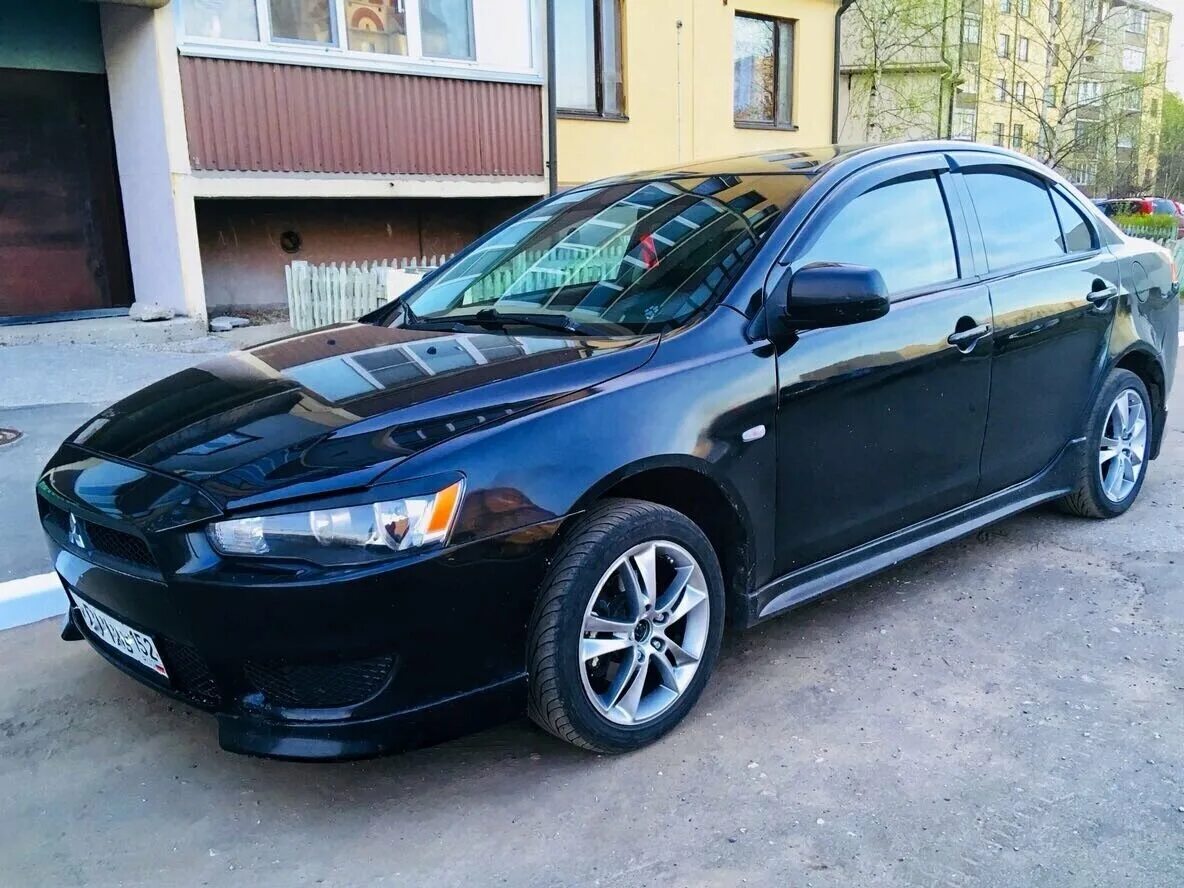 Купить митсубиси лансер на авито. Mitsubishi Lancer, 2007 чёрная. Mitsubishi Lancer x 2007 черный. Митсубиси Лансер 10 черный. Митсубиси Лансер 2007 черный.