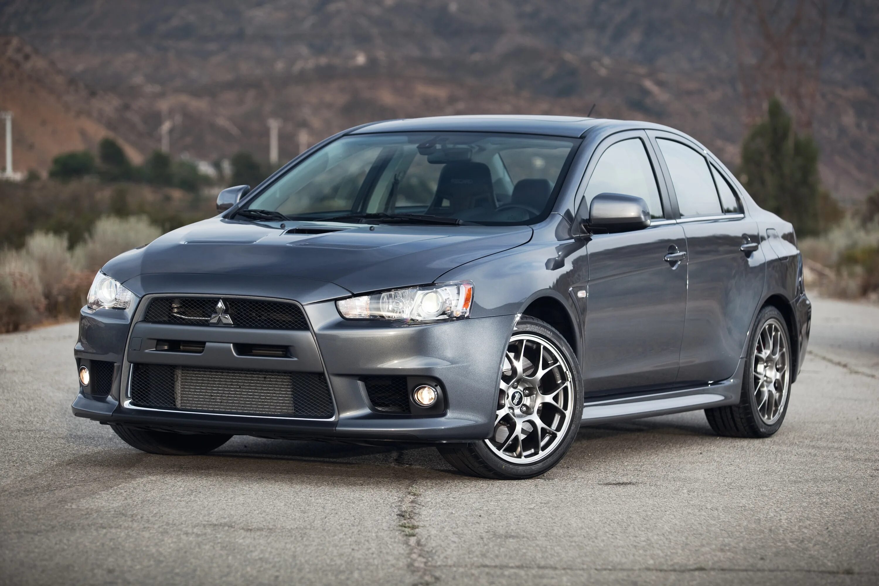 Mitsubishi Lancer 2011. Митсубиси Лансер Эволюшн. Mitsubishi Lancer Evolution 10. Лансер Эволюшн 2010. Mitsubishi lancer фото