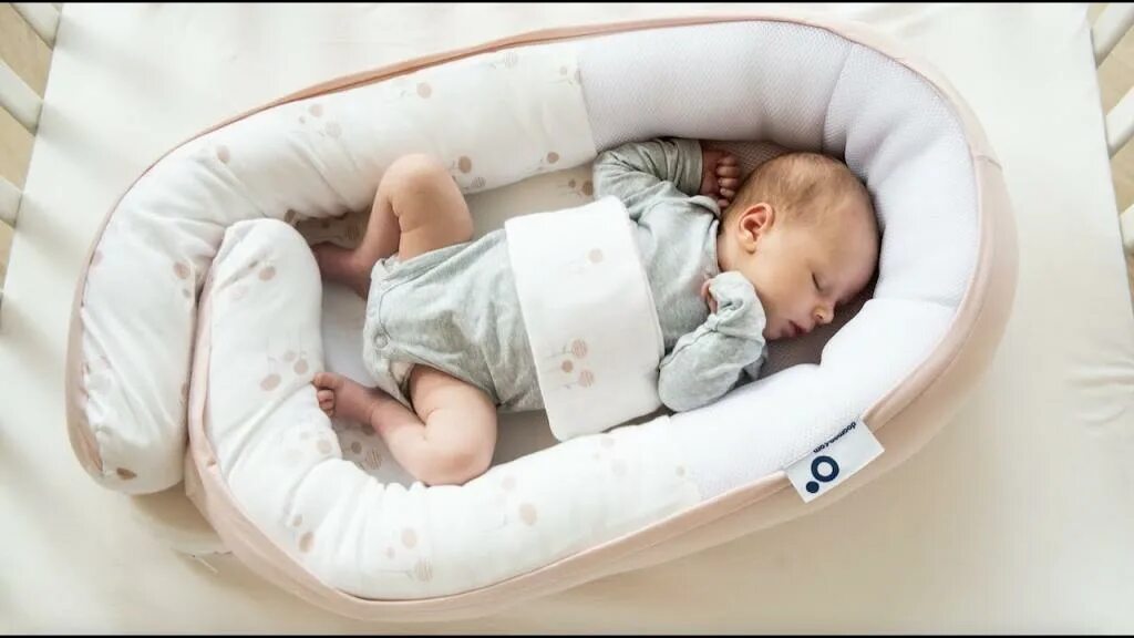 Можно ребенку спать в коконе. Кокон Дремушка. Кокон коконабэби. Кокон дарбасазасы. Doomoo Basics Supreme Sleep Plus кокон для новорожденного.