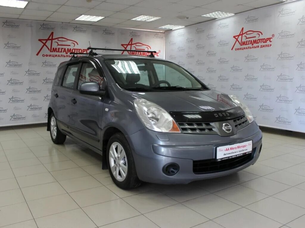 Nissan note 2012. Nissan note 1. Nissan note 2012 салон. ниссан ноут какой бензин. ниссан ноут какой бензин.