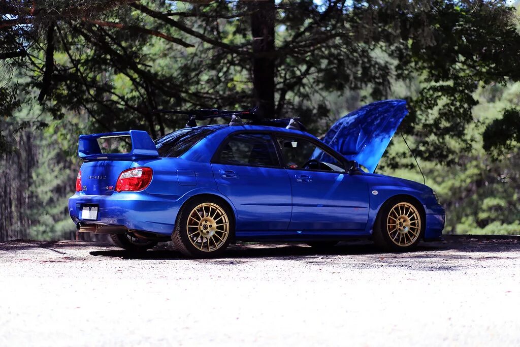 Шины subaru wrx. Субару Impreza WRX STI 2002. Enkei Subaru Impreza. Subaru Impreza Enkei STI. Enkei rpf1 Subaru.