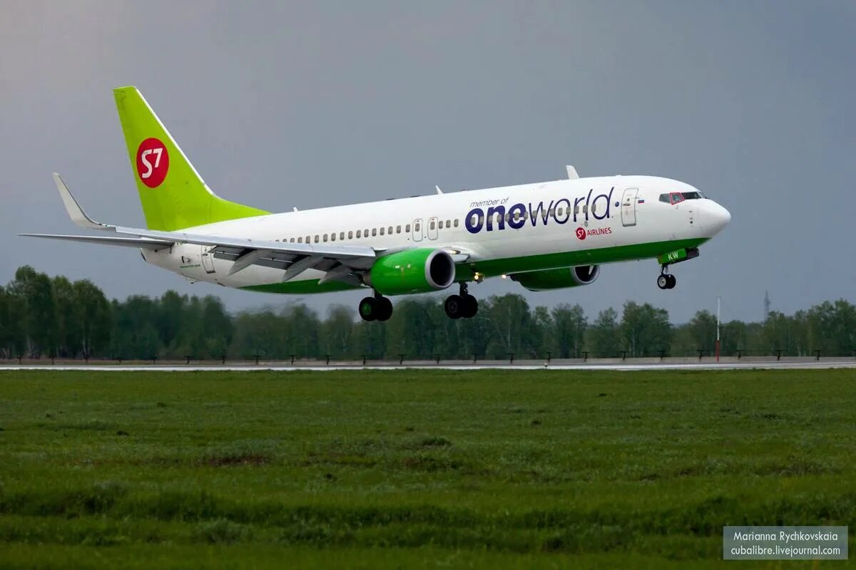 S7 one World livery. Боинг 737 с7. S7 в ливрее ONEWORLD. S7 авиакомпания ONEWORLD.