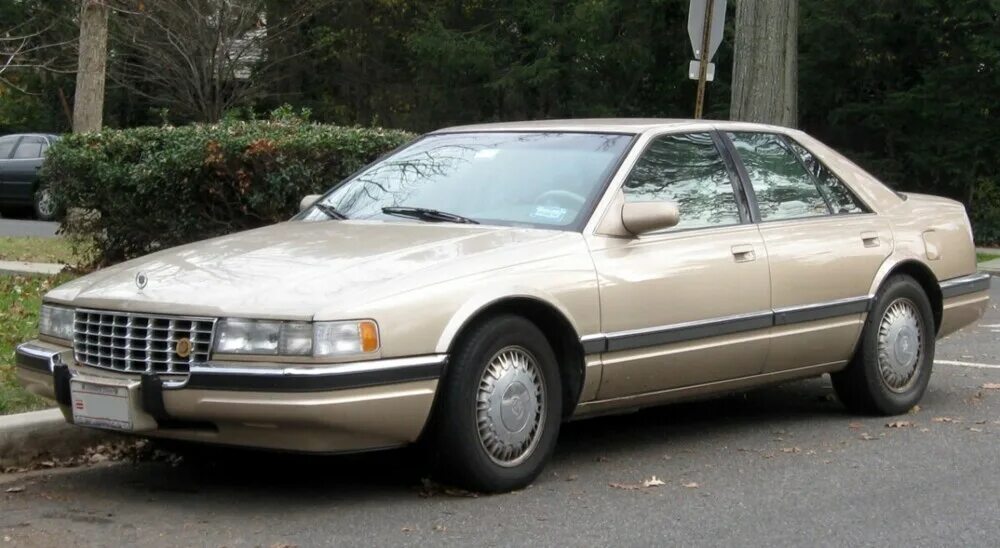Cadillac seville sts 1992 года. Кадиллак севиль sts 1994. Cadillac seville 1992. Cadillac seville 1975. 1992 cadillac seville sls.