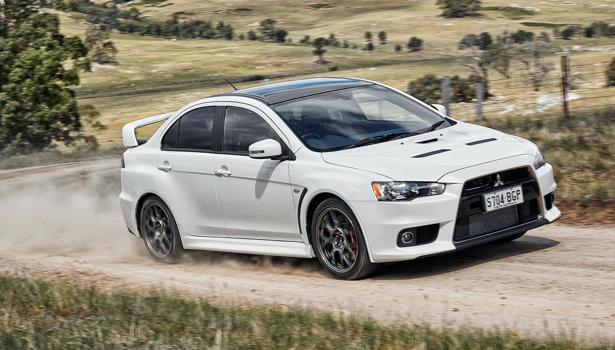 Mitsubishi lancer 10 поколения. Митсубиси Эволюшн 10. Митсубиси Лансер Эволюшн. Митсубиши Лансер 10. Митсубиси Лансер 10 EVO.