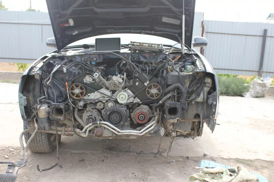 ауди а6 с5 с разобранной мордой. разборка а6 с5. снятие морды ауди а6 с5. 4. разборка а6 с5.