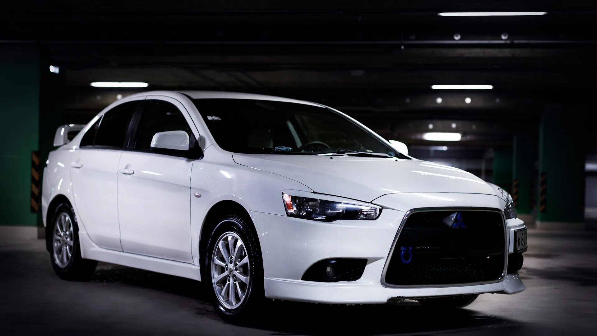 Lancer 10 кузов. Mitsubishi Lancer x 2015 Restyling. Mitsubishi Lancer x Рестайлинг 2012. Митсубиши Лансер 10. Лансер 10 Рестайлинг.