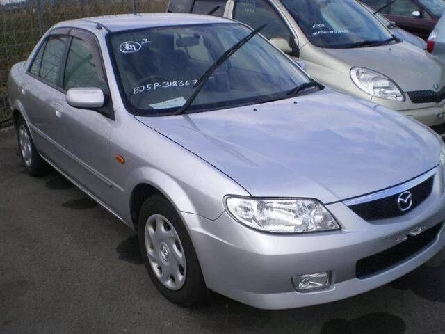 Куплю мазду 2003 год. Mazda familia 2003 г. Мазда фамилия 2004 года. Мазда фамилия 2003 года механика. Мазда фамилия серебристая.