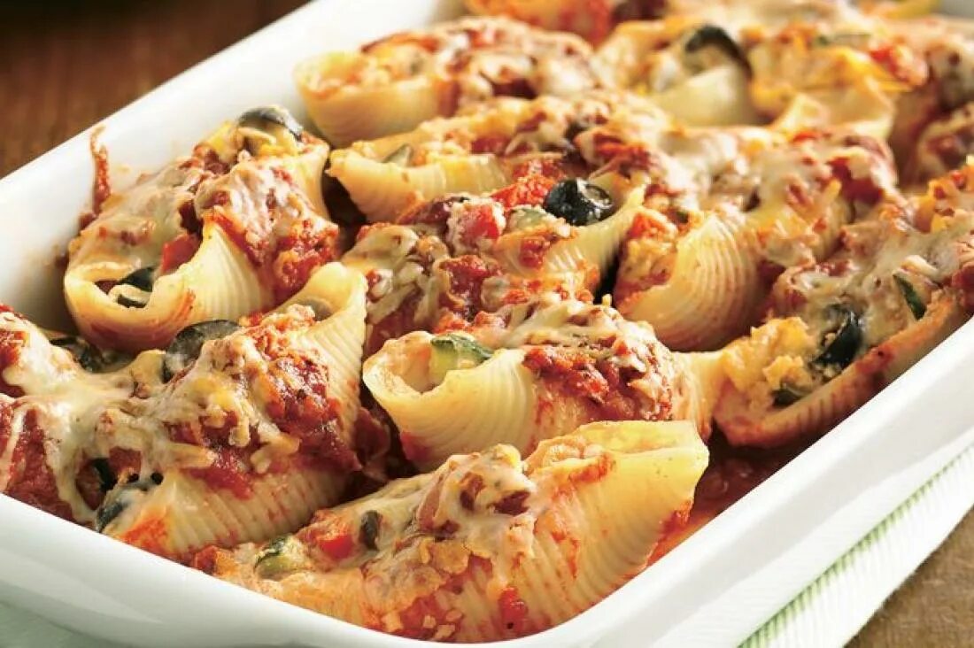 Паста конкильони. Феллини фаршированные фаршем. Макароны фаршированные ракушек в духовке. Конкильони фаршированные фаршем. Макароны фаршированные ракушек в духовке.
