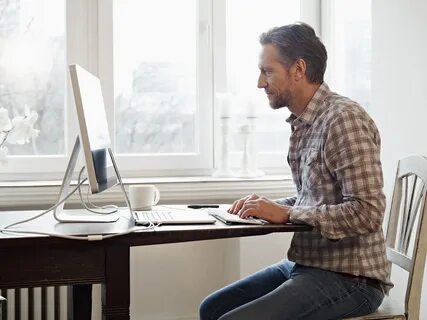 He is at home working