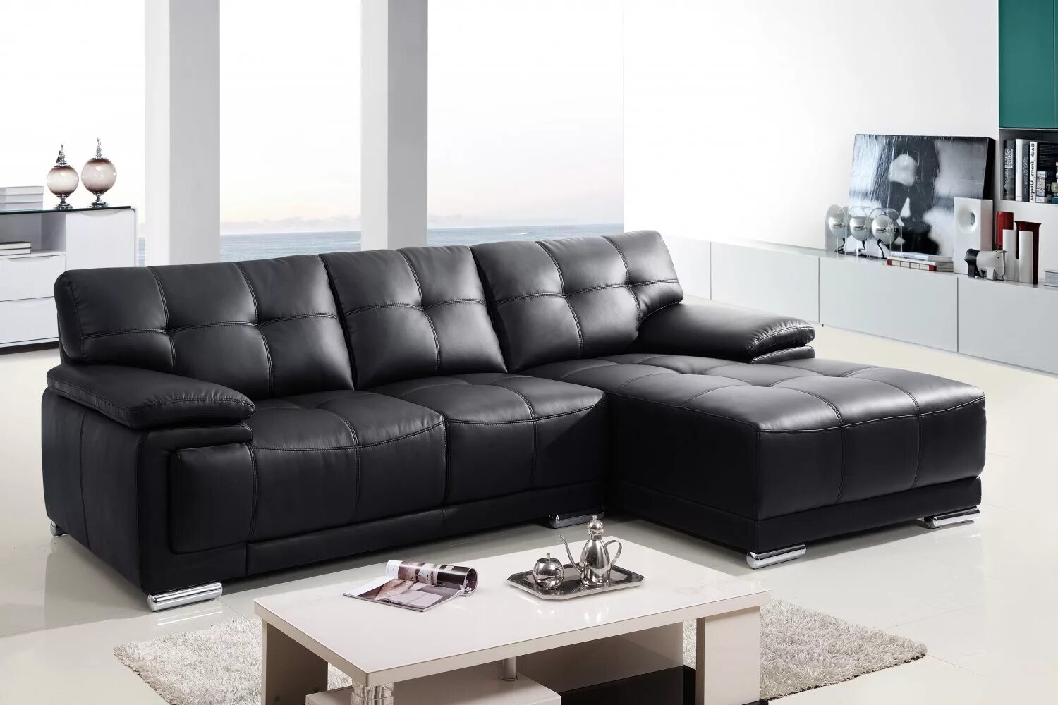 Стильный кожаный диван. Диваны кожаные современные. Черный кожаный диван. Черный кожаный угловой диван.