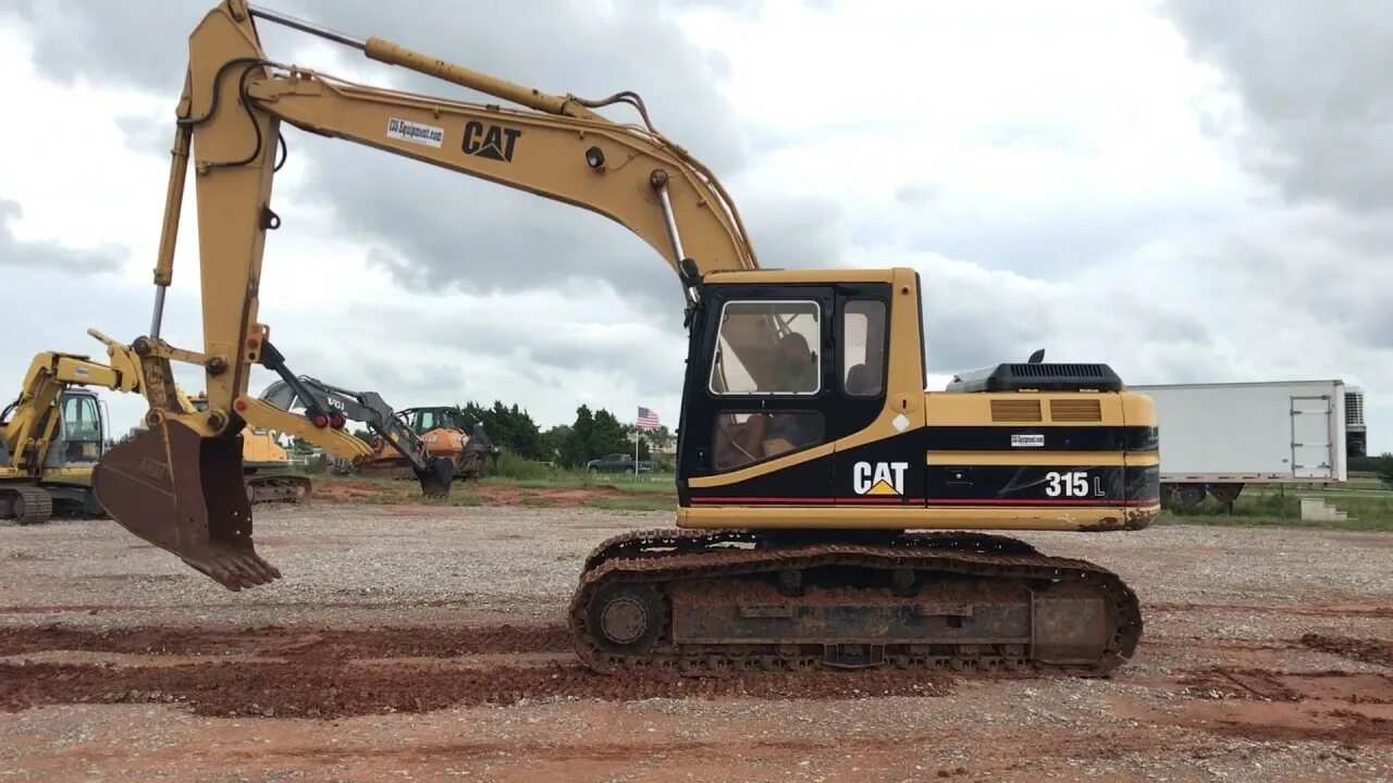 Экскаватор ютуб. Катерпиллер 315. Экскаватор Caterpillar м315. Caterpillar 315d l. Экскаватор Caterpillar 360.