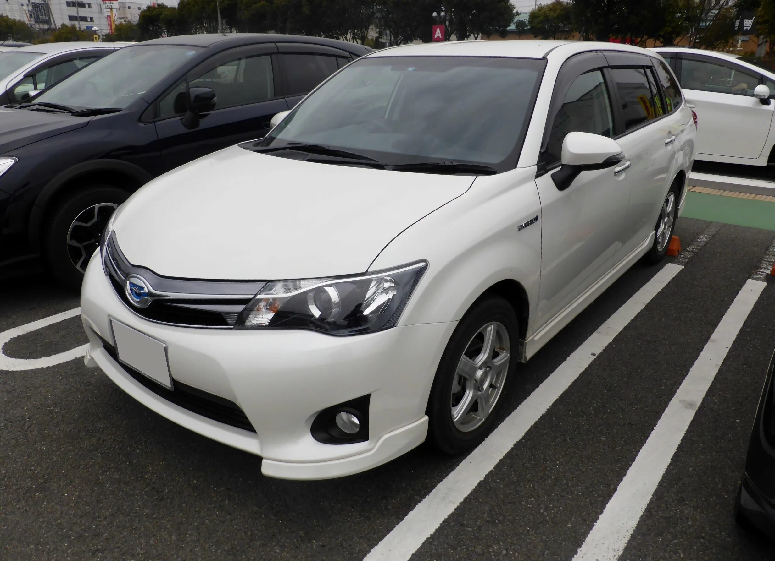 Toyota Corolla Fielder Hybrid. Toyota Corolla Fielder Hybrid g. Toyota Corolla Fielder 2014. Тойота Филдер 165 гибрид.