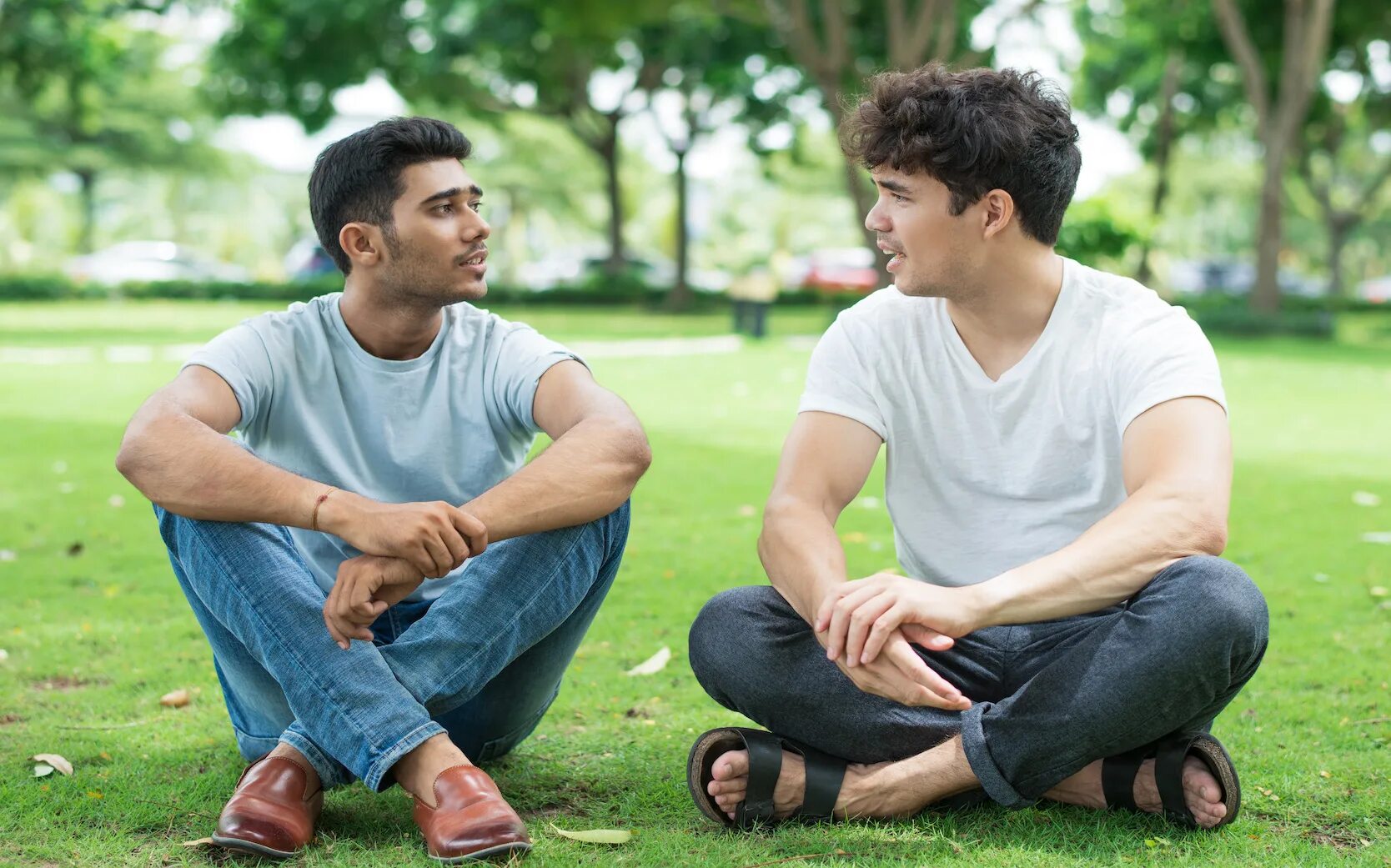 Man talking. Male friends. Talking friends. Two men talking friendly. Discussing your friends