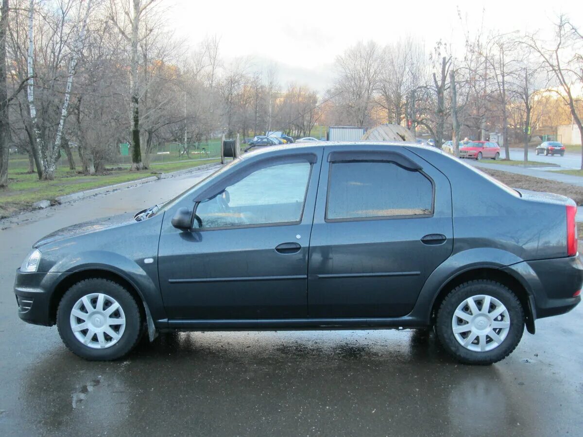 Renault logan 2010. Рено логан 2010 серый. Рено логан 1 2010 года. Рено логан мчс. Рено логан 2010г.