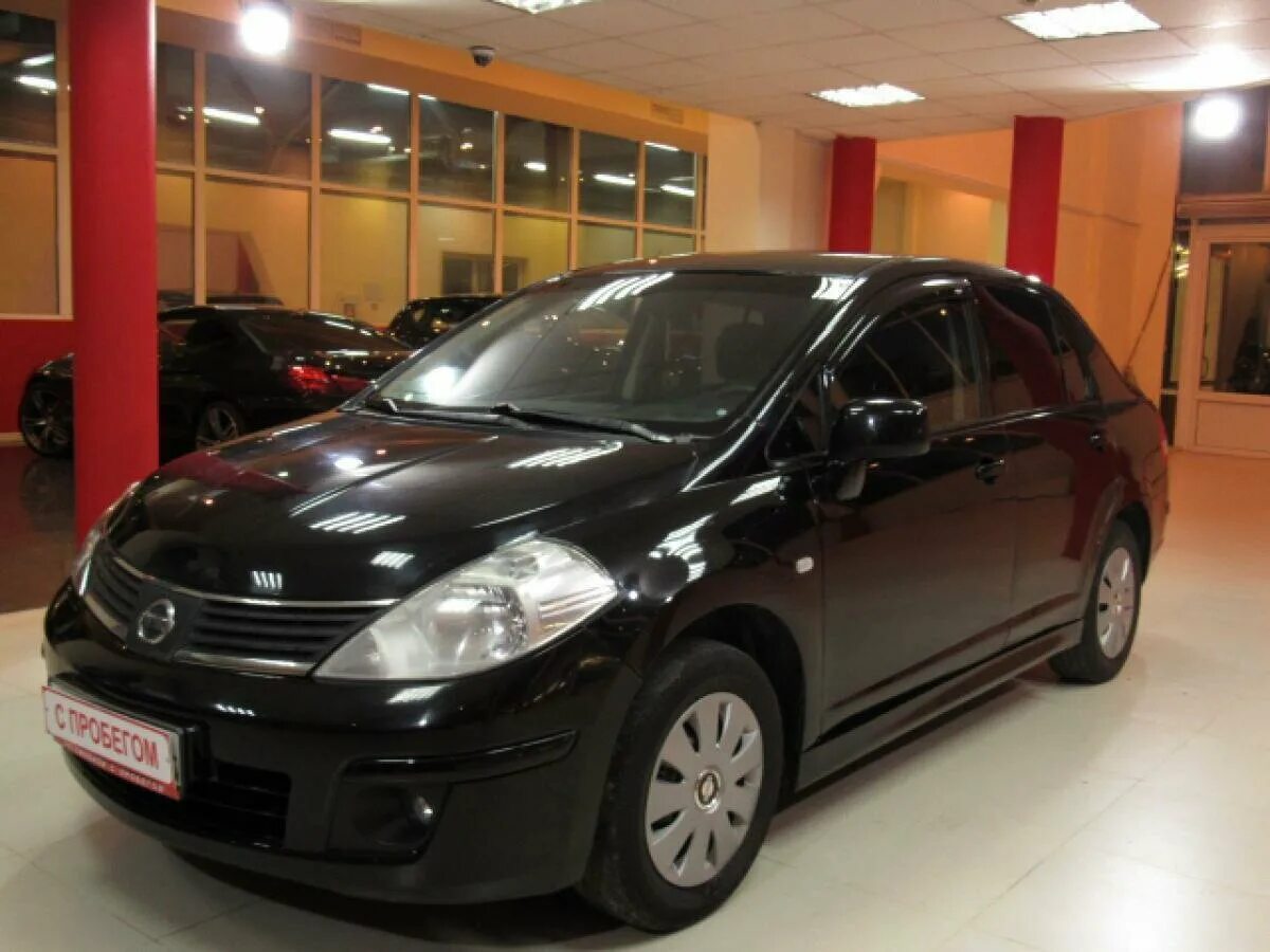 Ниссан тиида купить 2010. Nissan Tiida 2011. Nissan Tiida 2011 седан. Ниссан Тиида 2008 седан черный. Ниссан Тиида черная.