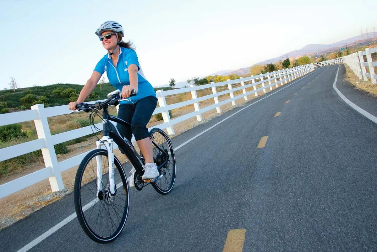 Riding our bikes. Электрический Bike. Девушка на электровелосипеде. Райд э байк. Велосипедист в э.