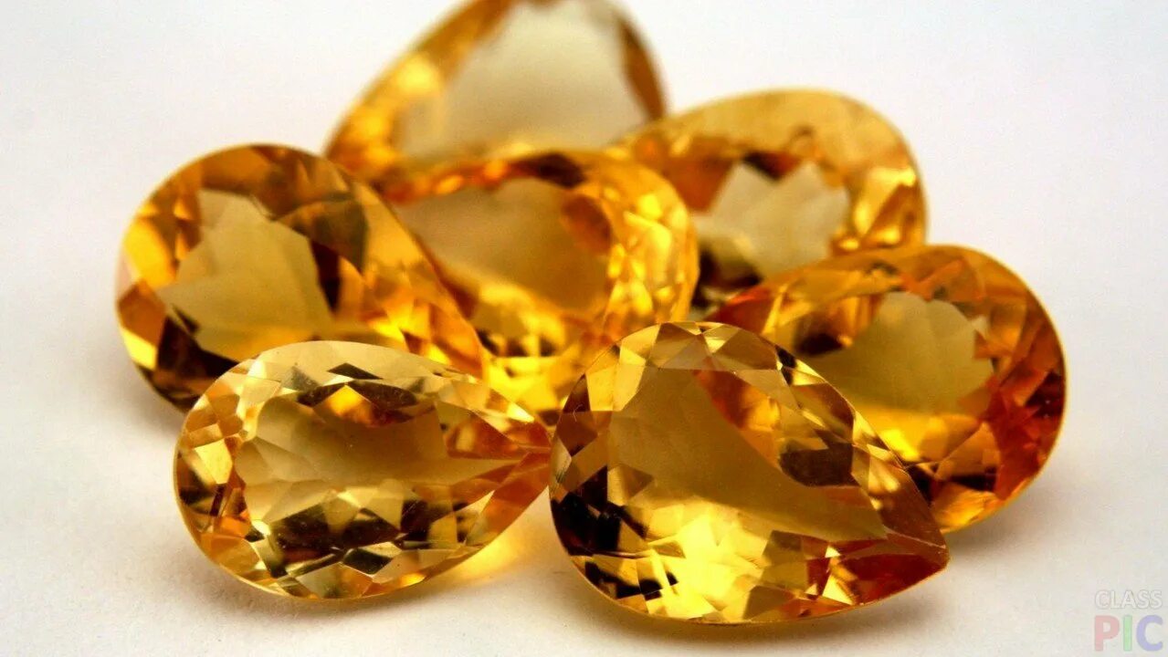 фото желтых камней. желтый рубин. фото желтых камней. желтая яшма камень. желтый сапфир эмеральд.