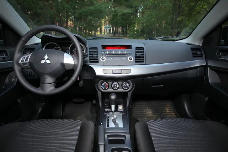 Обд лансер 10. Mitsubishi Lancer 10 салон. Mitsubishi Lancer 10 Interior. Mitsubishi Lancer 2008 салон. Mitsubishi Lancer x салон.