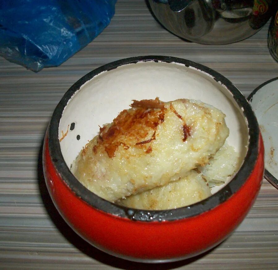 цеппелин блюдо. цеппелин картофельный с фаршем. цепеллины. цеппелин блюдо литовской кухни. литовское блюдо цеппелины.