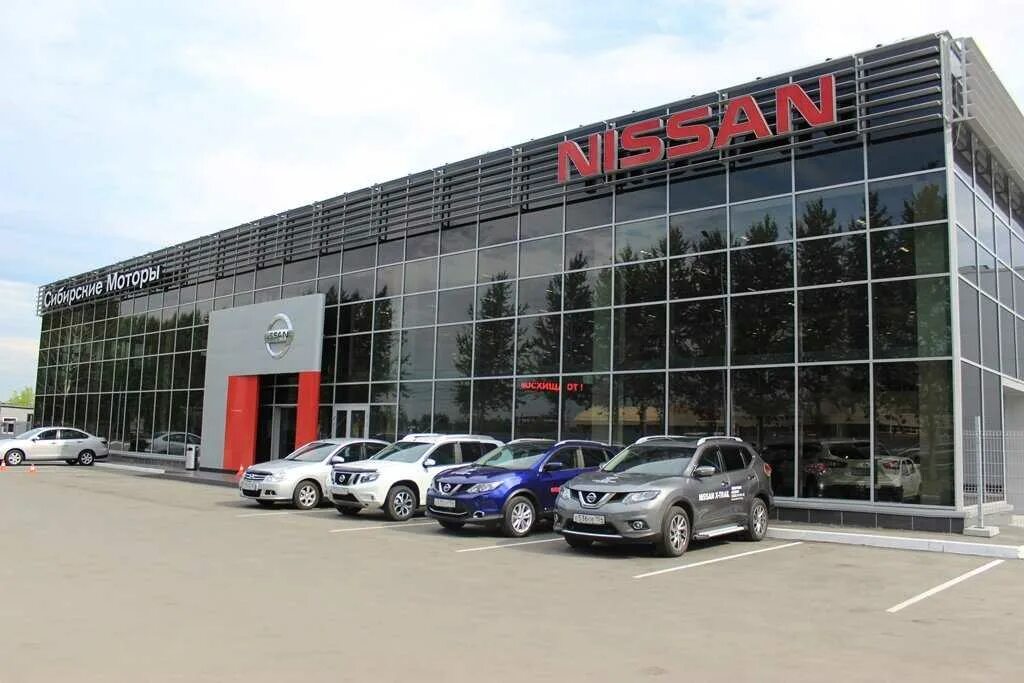 Сибирские моторы новосибирск. Ниссан новосибирск. Ниссан новосибирск. Двигатель логотип. Станционная 51 новосибирск автосалон.